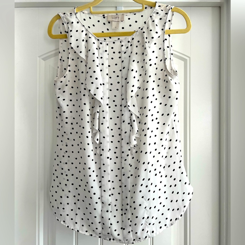 Polka dot sleeveless blouse